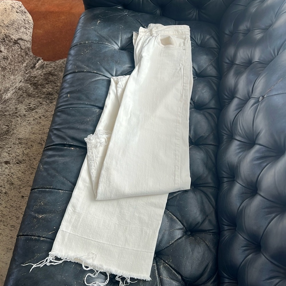 White ankle length wide leg jeans. Barley worn